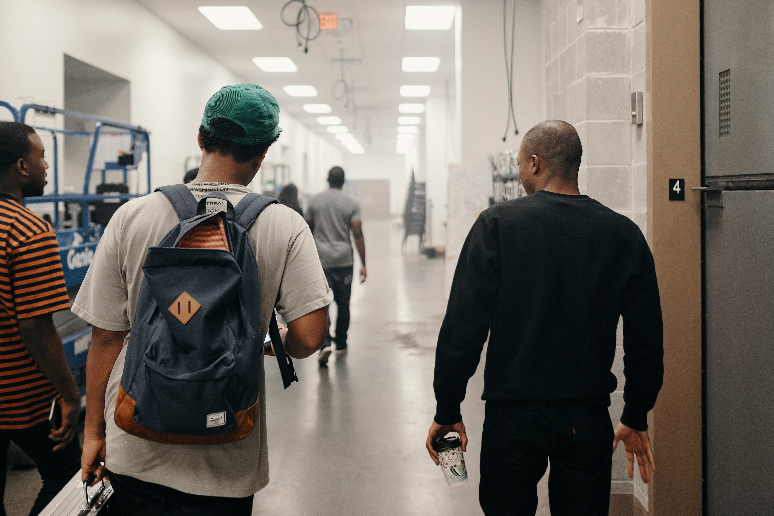 Vince and crew walking to the next show. Â© TODD SPOTH PHOTOGRAPHY, 2016