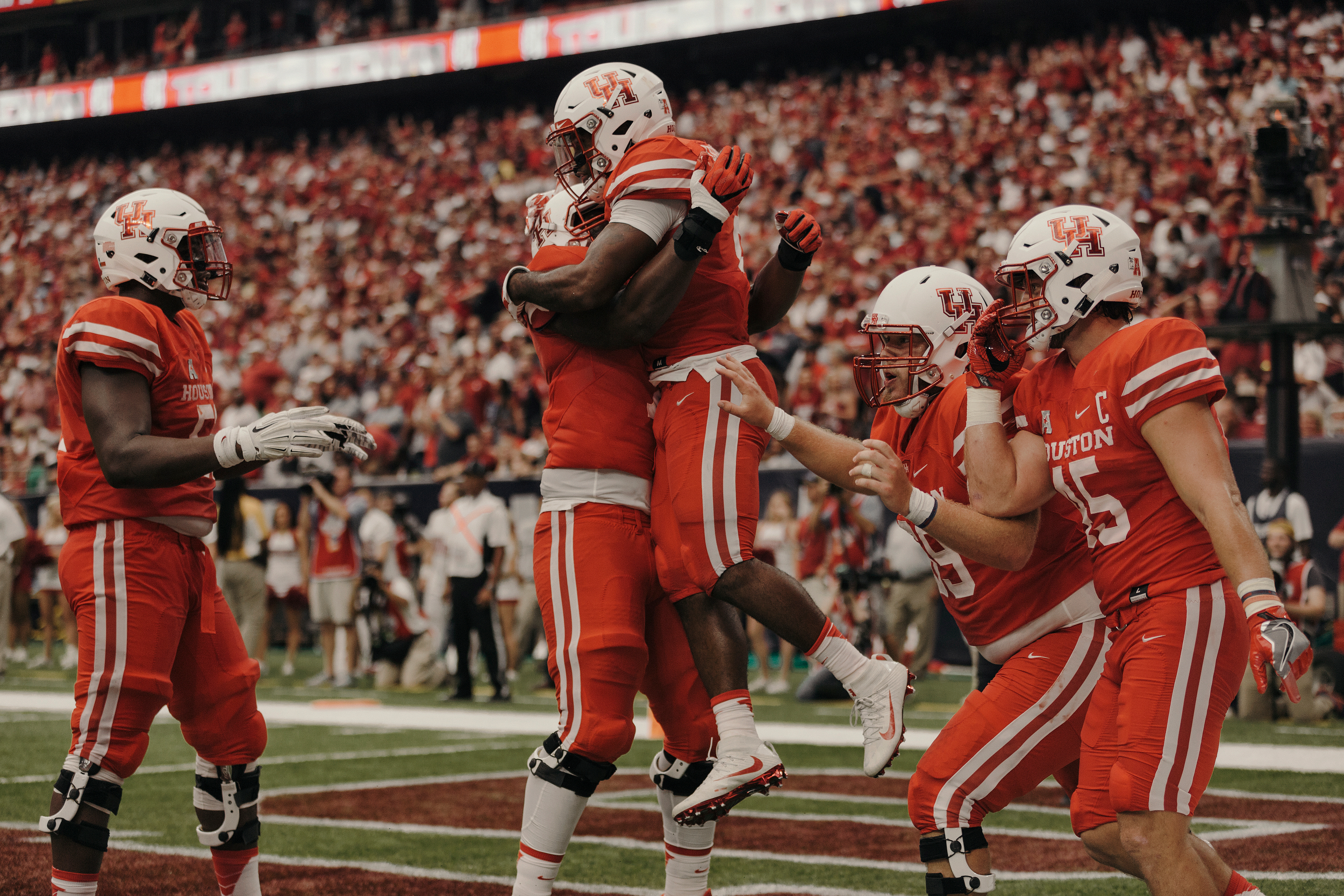 The University of Houston team celebrates an early touchdown. Todd Spoth for The New York Times.